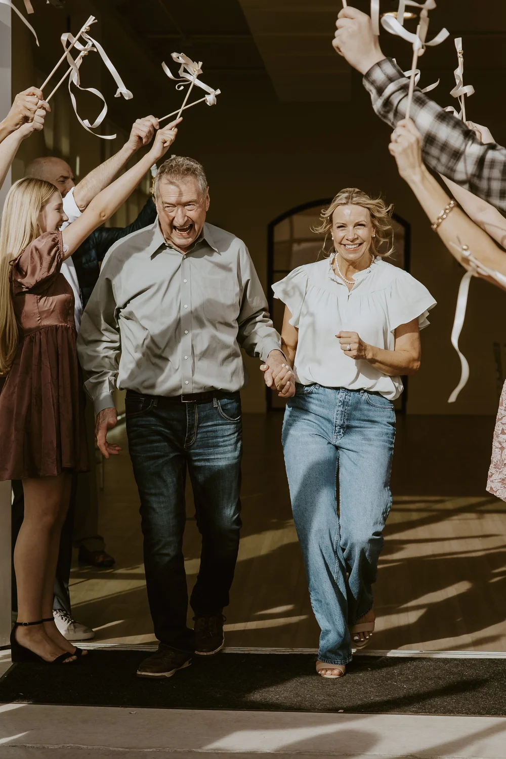 Newlywed couple exiting the ceremony
