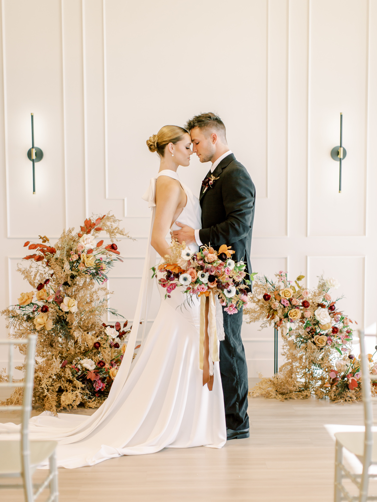 Couple standing together in the grand hall