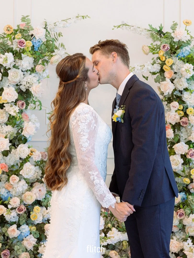 Couple kissing at The Aster